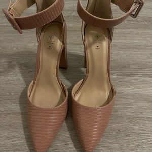 Size seven pumps never worn!